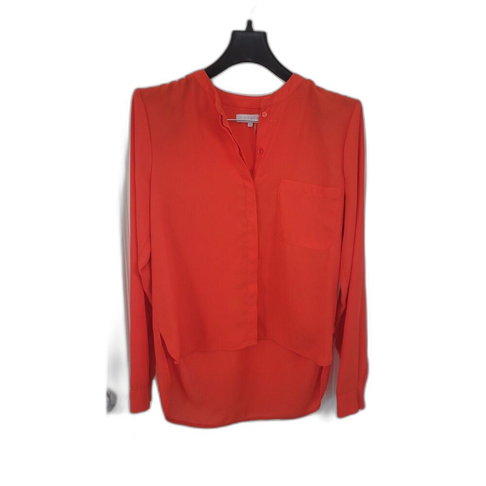 1. State Orange Button Down High Low Pocket Blouse